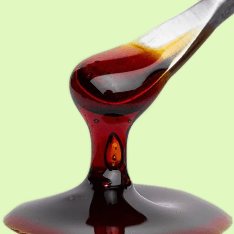 Rosin de chat CBD de 1 g avec 55 % de CBD, aspect translucide et huileux, présenté dans un emballage transparent.