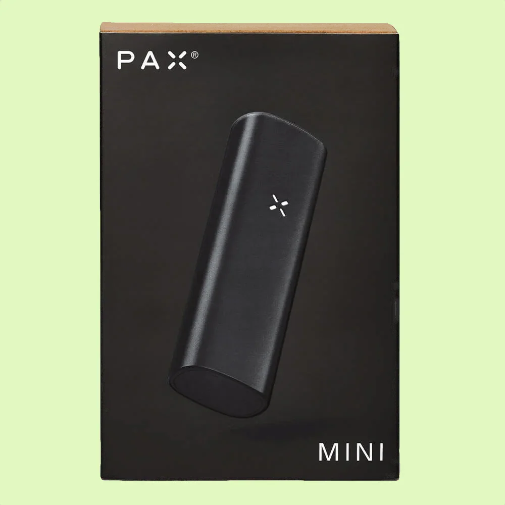 Vaporisateur PAX Mini Onyx de Herbe à chat CBD avec design compact et noir, utilisé pour inhaler des extraits.